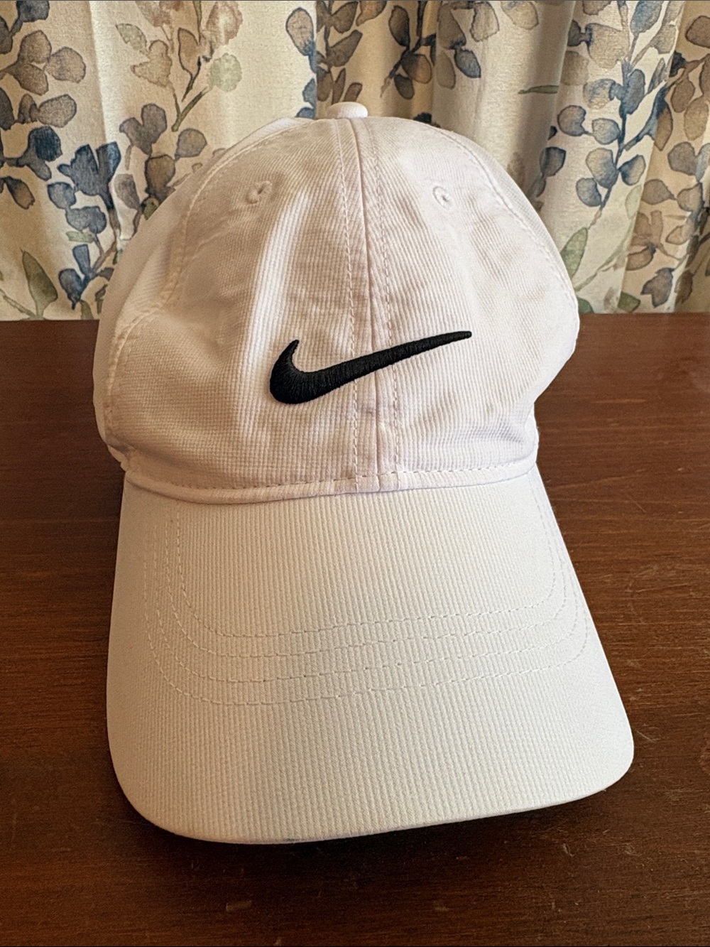 Nike White Baseball Cap with Black Swoosh and Velcro adjustable back